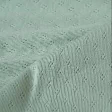 Material Verde Menta din bumbac organic Melissas Textură Pointelle verde mentă din bumbac organic Melissas – material natural premium
