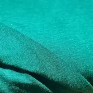 Material din lână merinos verde emerald Melissas cu textură fină