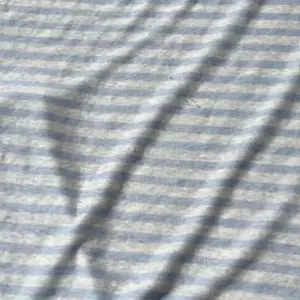 Material din in tricotat albastru deschis Melissas