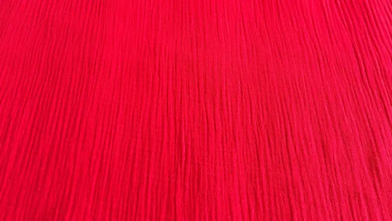 material-muselina-rosu-melissas Material muselină organică roșie Melissas – textură naturală și respirabilă